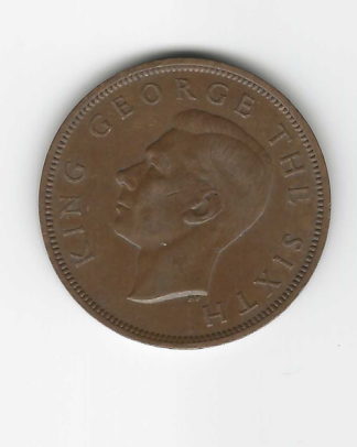 Type set New Zealand pennies. Three coins.