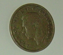 3 Silver NZ threepences.