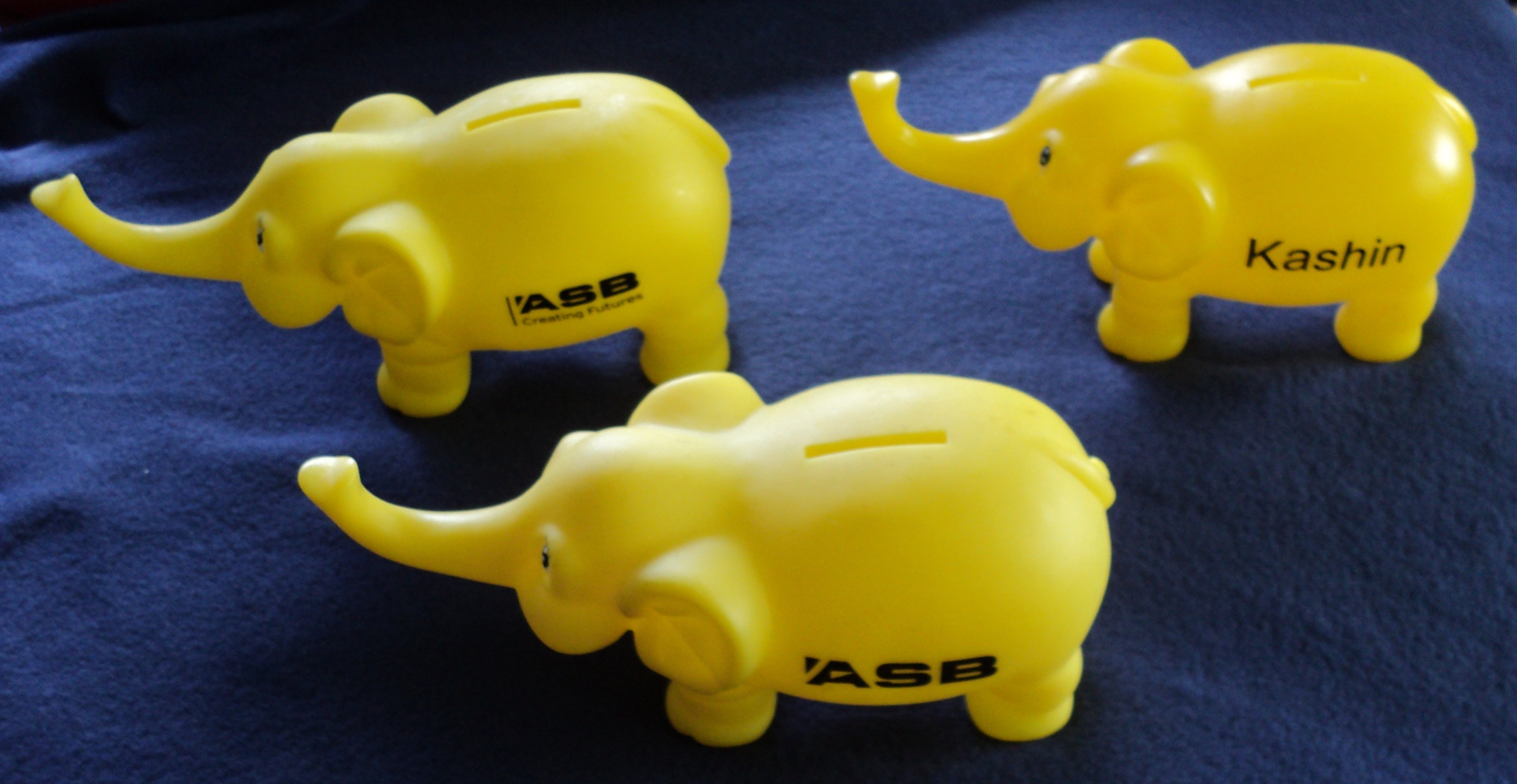 Three different ASB Yellow Kashin Money boxes | Coin.NZ New Zealand coins and online collectible ...