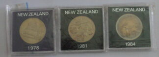 Three different NZ cased uncirculated large dollars