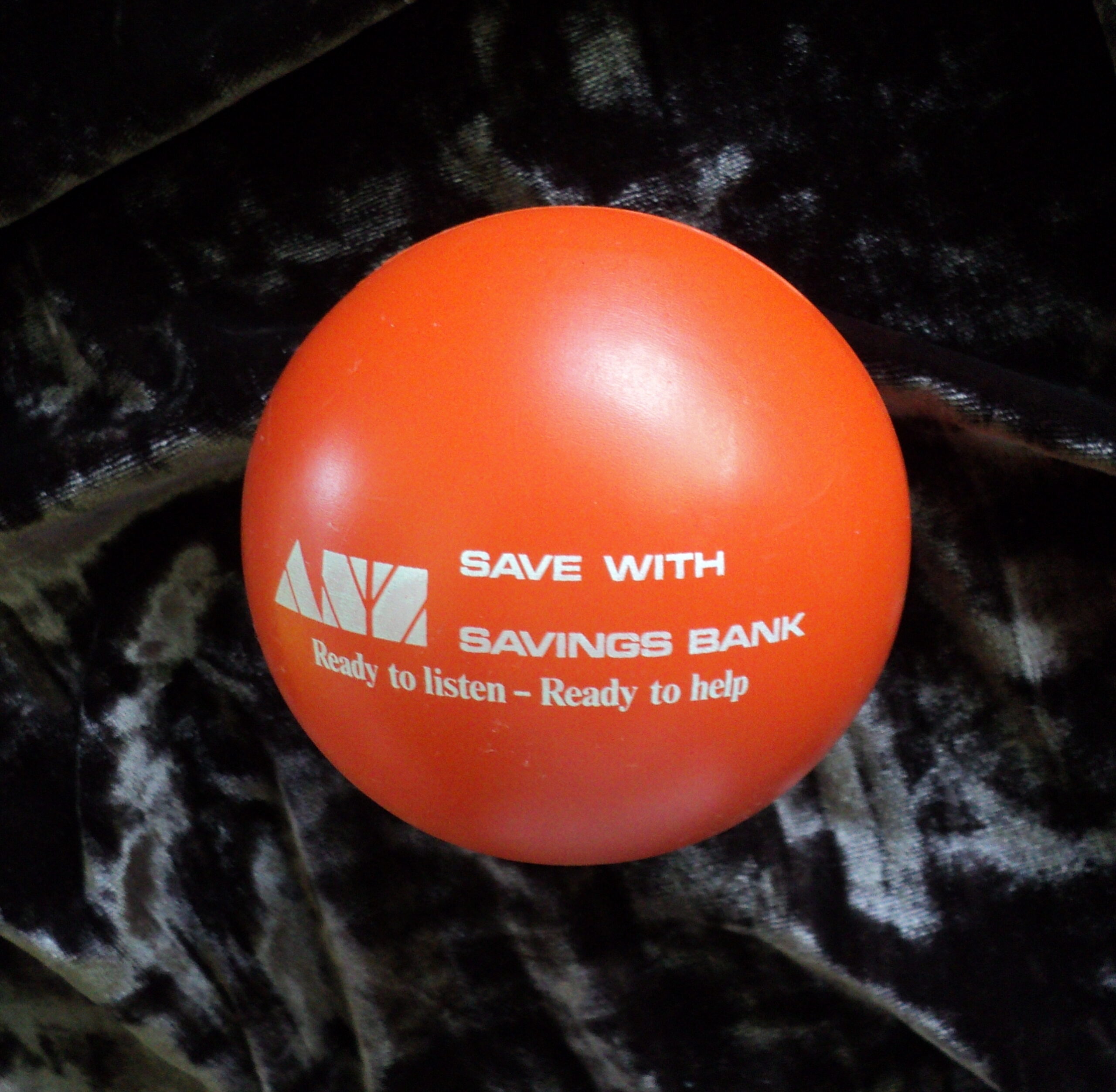 ANZ Smiley Face Ball Moneybox. Orange. Great condition.